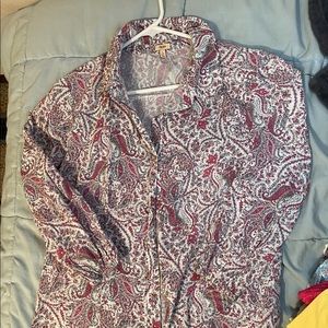 It’s a long sleeve button up. Brand is Reba.